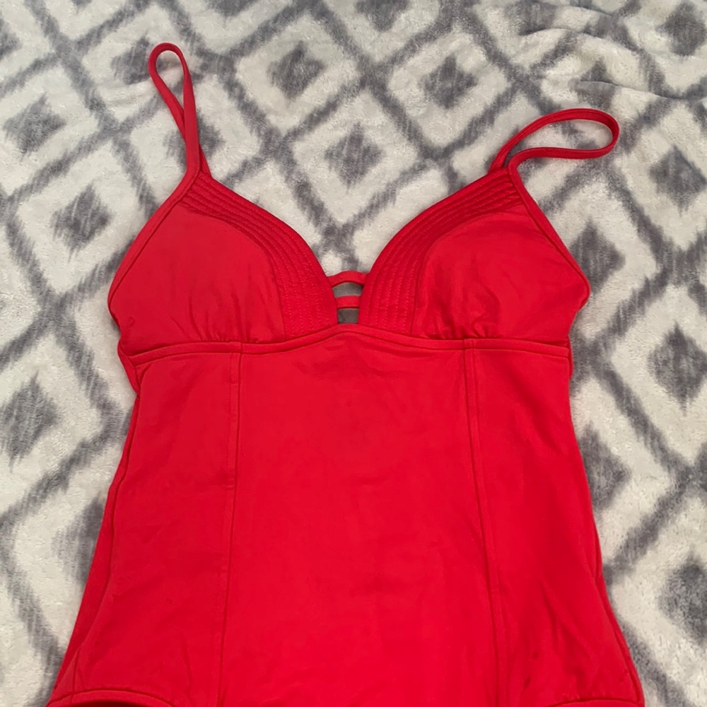 Bright red one piece swimsuit with removable padding